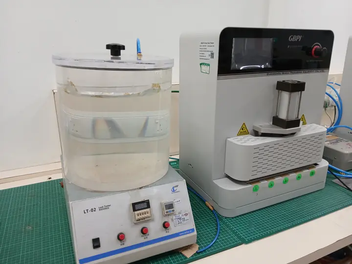 Vacuum leak tester (left) and five-point heat-seal tester (right)