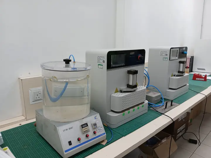 Leak test: a sealed bag goes under water in a vacuum; bubbles mean a leak